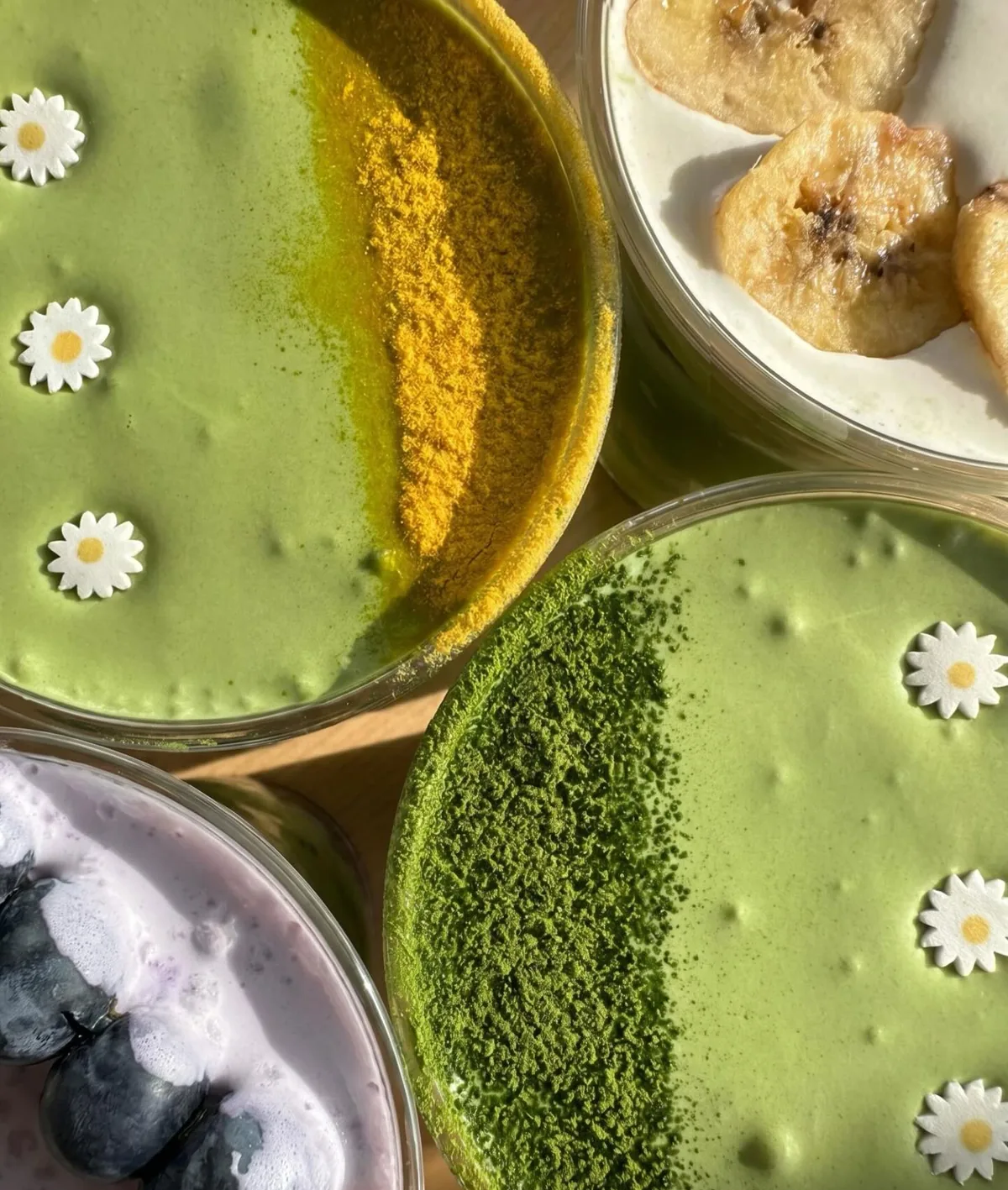 Four matcha drinks seen from above