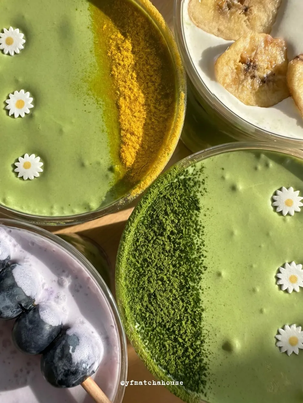 Matcha drinks with fresh fruit toppings, seen from above